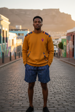 AMO Lekker Sweater in Mustard with shweshwe shoulder panels styled with Royal Weave shorts — Africa Made Only