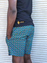 Shweshwe Teal beach shorts and black Shweshwe t shirt