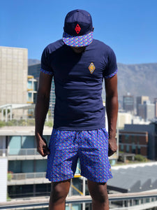 Blue t shirt with shweshwe and swim shorts and shweshwe peak cap